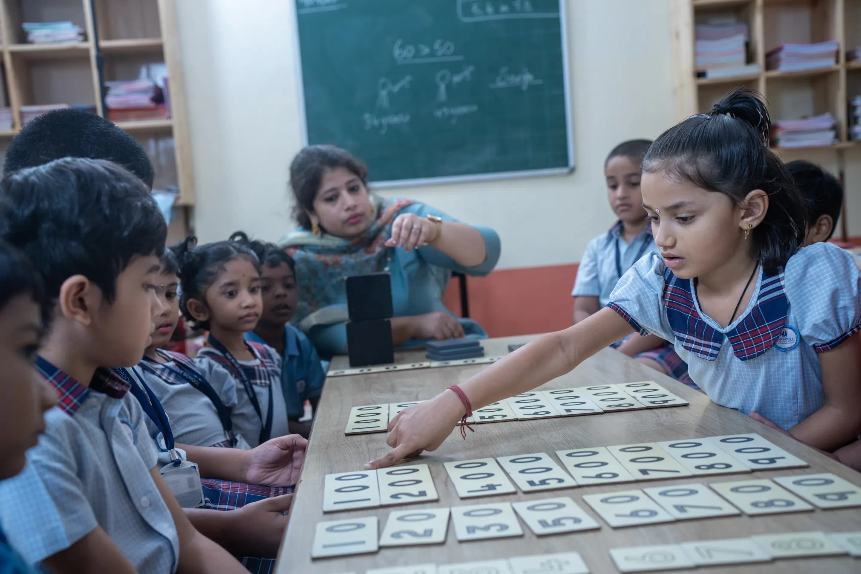 Teacher guiding a student